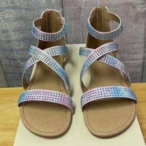 Brand new easy zip girls SO sandals. Size 4.